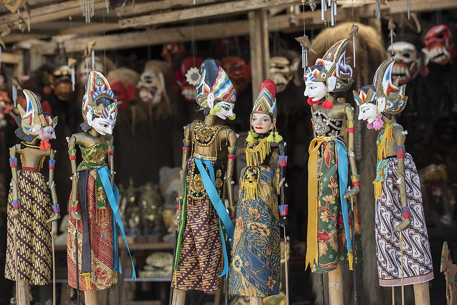 Souvenir from Bali island. Traditional wood painting puppet, Indonesia